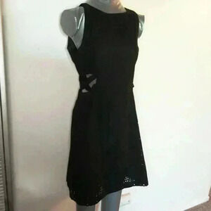 Nanette Lepore Eyelets above the knee black mini dress size 4